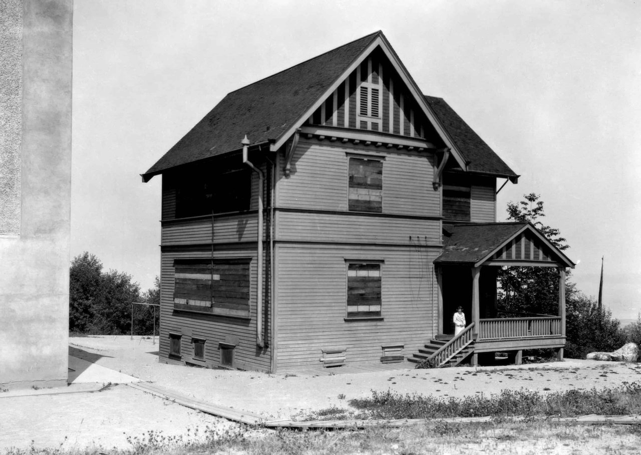 Miss Violette Russell on the steps of West Point Grey School (now Queen Mary School) in 1931. Source: City of Vancouver Archives Sch N5