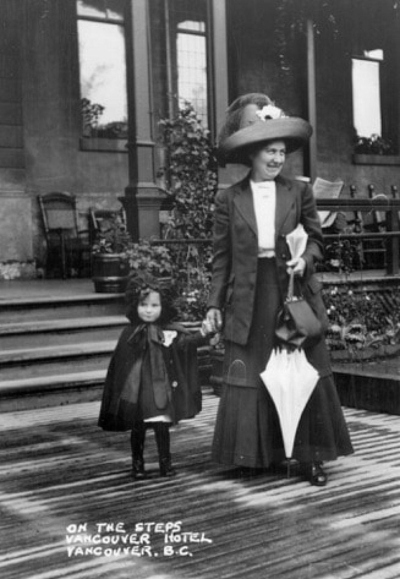 Mabel Bridgman with daughter Hazel on the steps of the first Hotel Vancouver, 1912. Photo Credit: Archibald T. R. Bridgman courtesy of the family collection. 